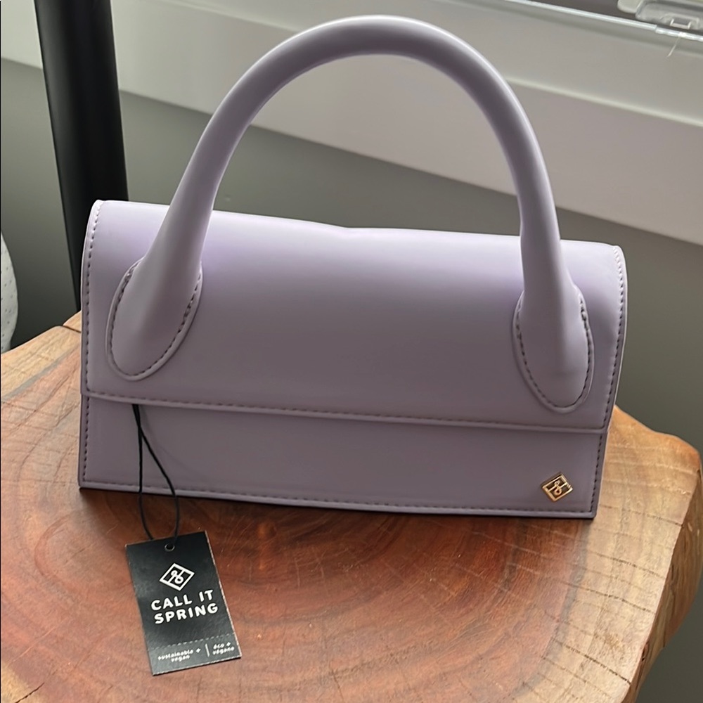 BNWT call it spring “aurevoir” bag in lilac. Vegan leather